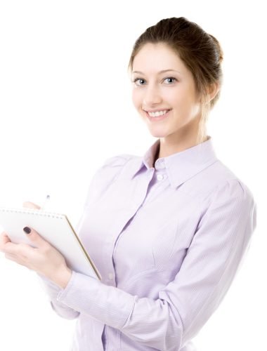 Friendly smiling beautiful girl writing in notepad, student or office woman in formal wear taking notes